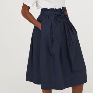 dark blue calf length midi skirt